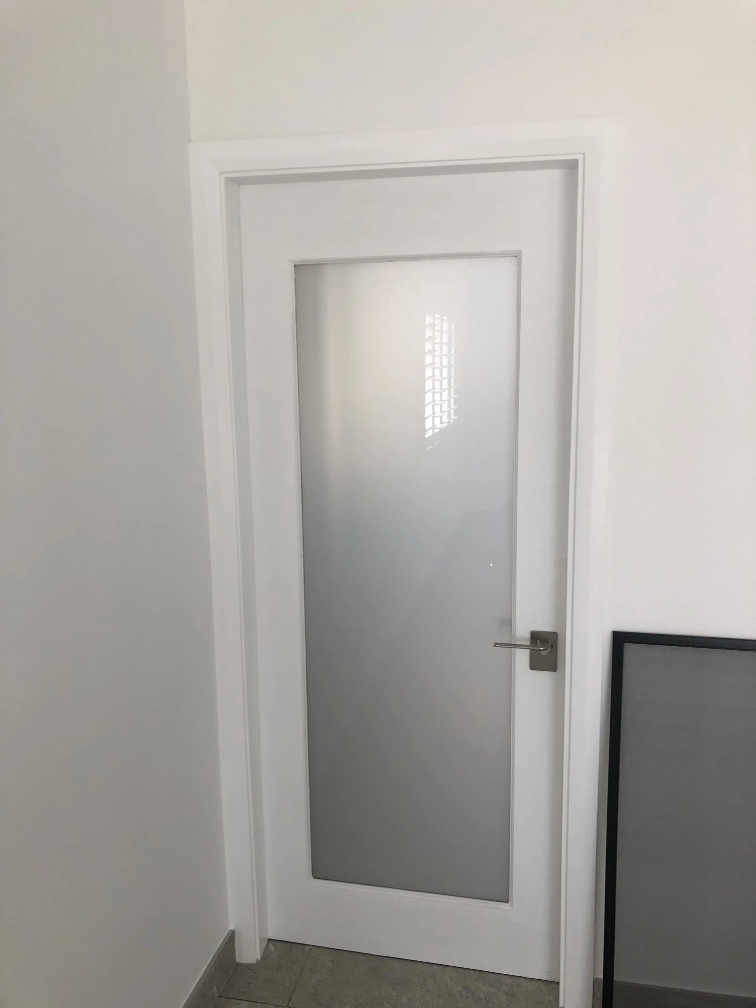 Frosted Glass internal door painted white with satin nickel handle