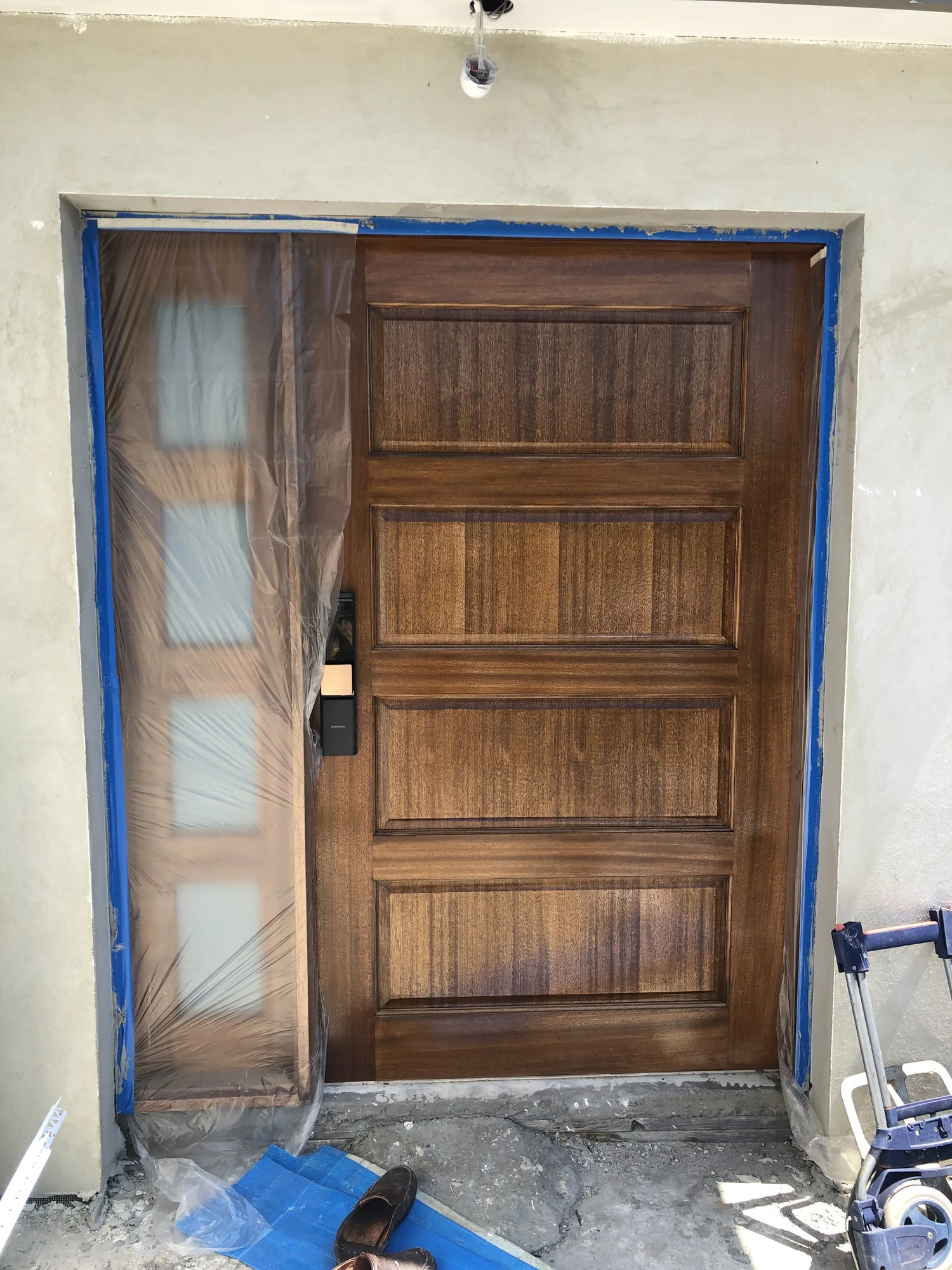 1200mm wide stained colonial front door with four panels and fixed glass side panel, fully installed