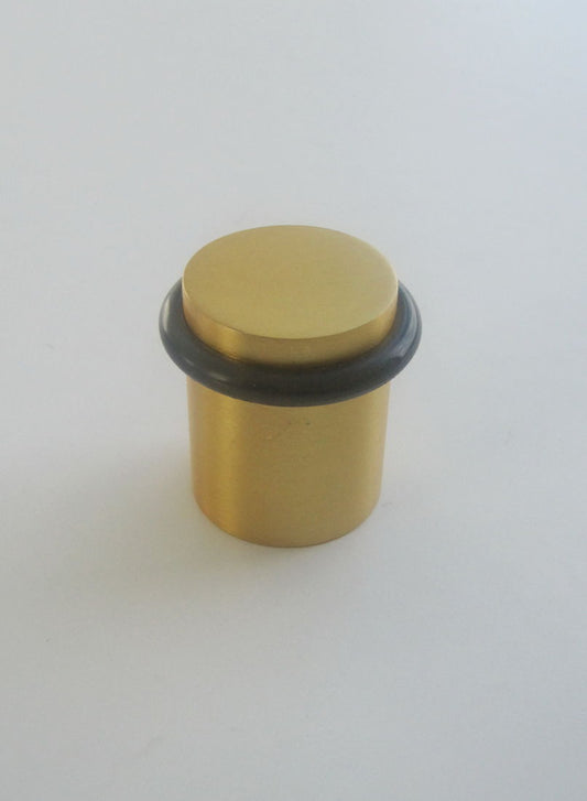 Gold door stopper fixed on floor
